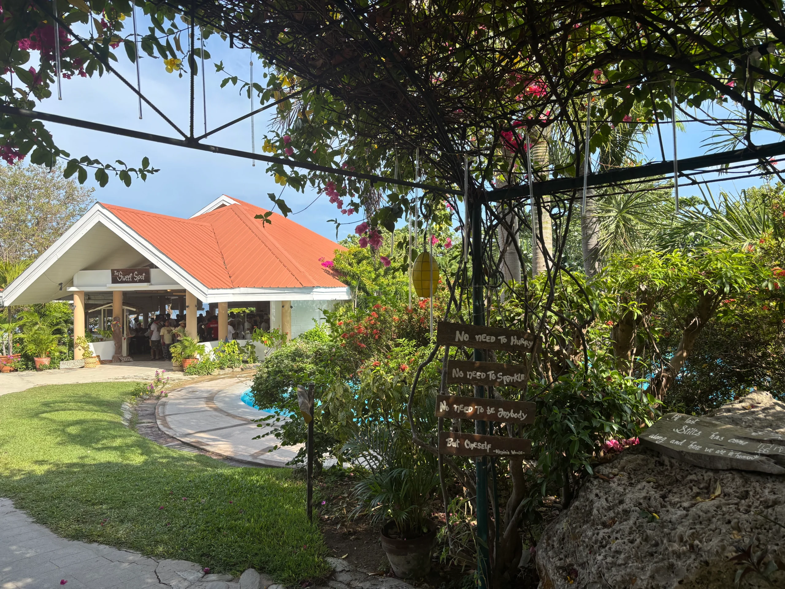 The Sweet Spot building and landscaped path at Stilts Calatagan