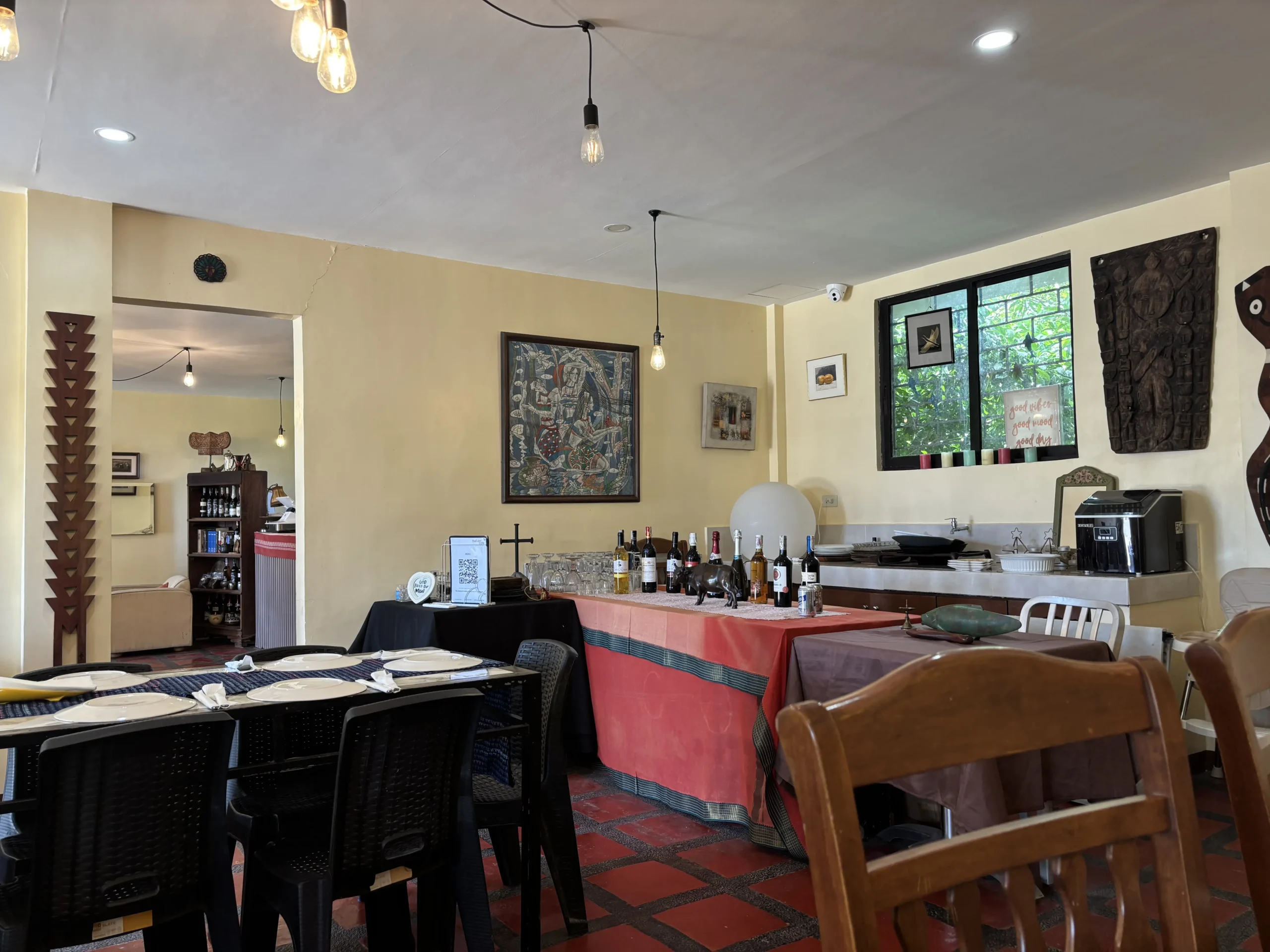 Dining tables and counter at Theiven Café