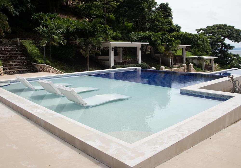 Calumbuyan Point swimming pool with submerged loungers